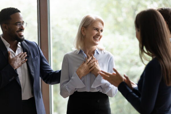 businesswoman staff member get praises congrats cheers compliments