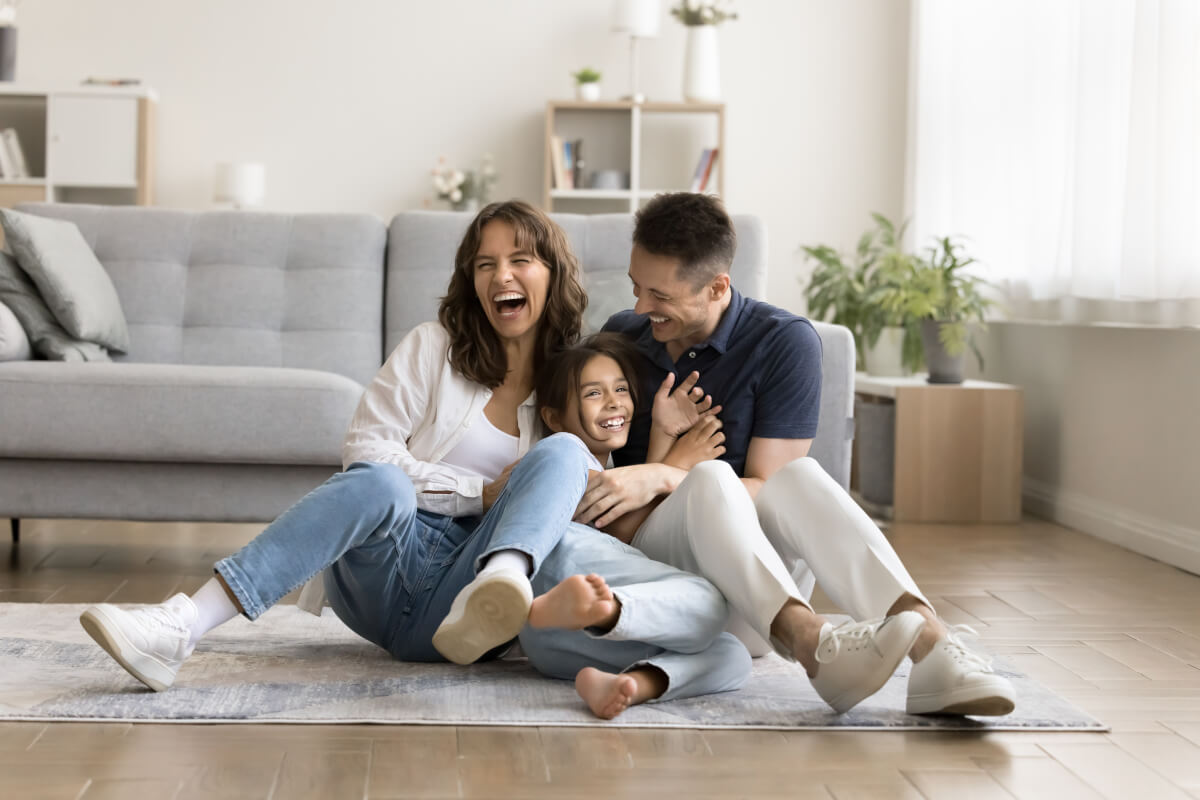 parents laughing with child