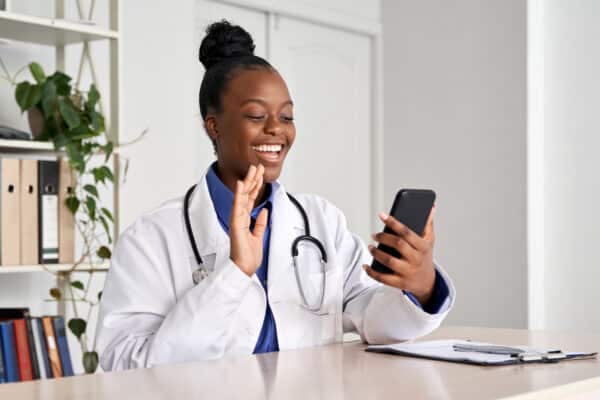 Doctor talking to patient virtually