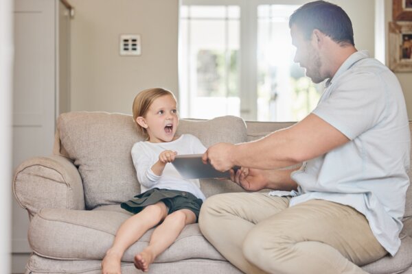 Little girl angry over dad taking away her tablet and screen time