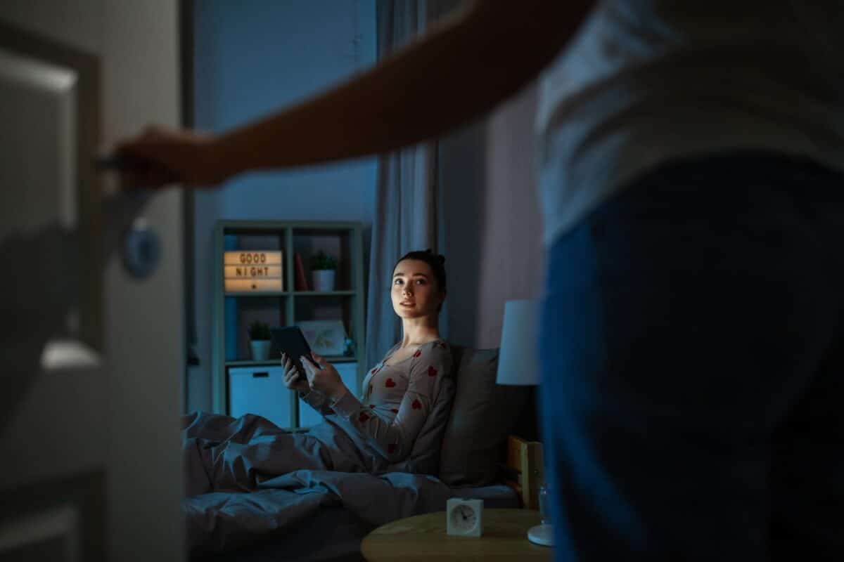 A parent enforcing bedtime